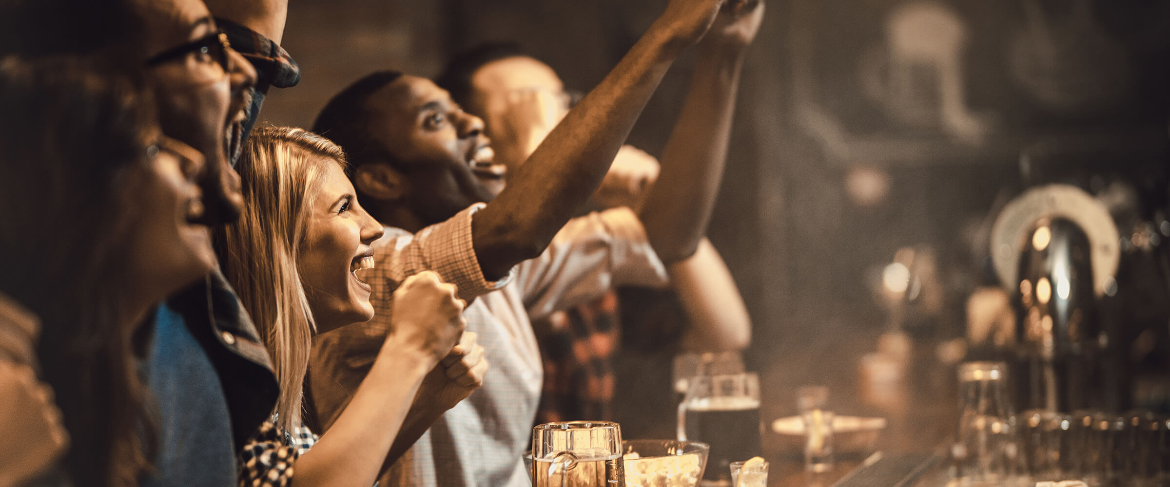 Cheering at a sports bar